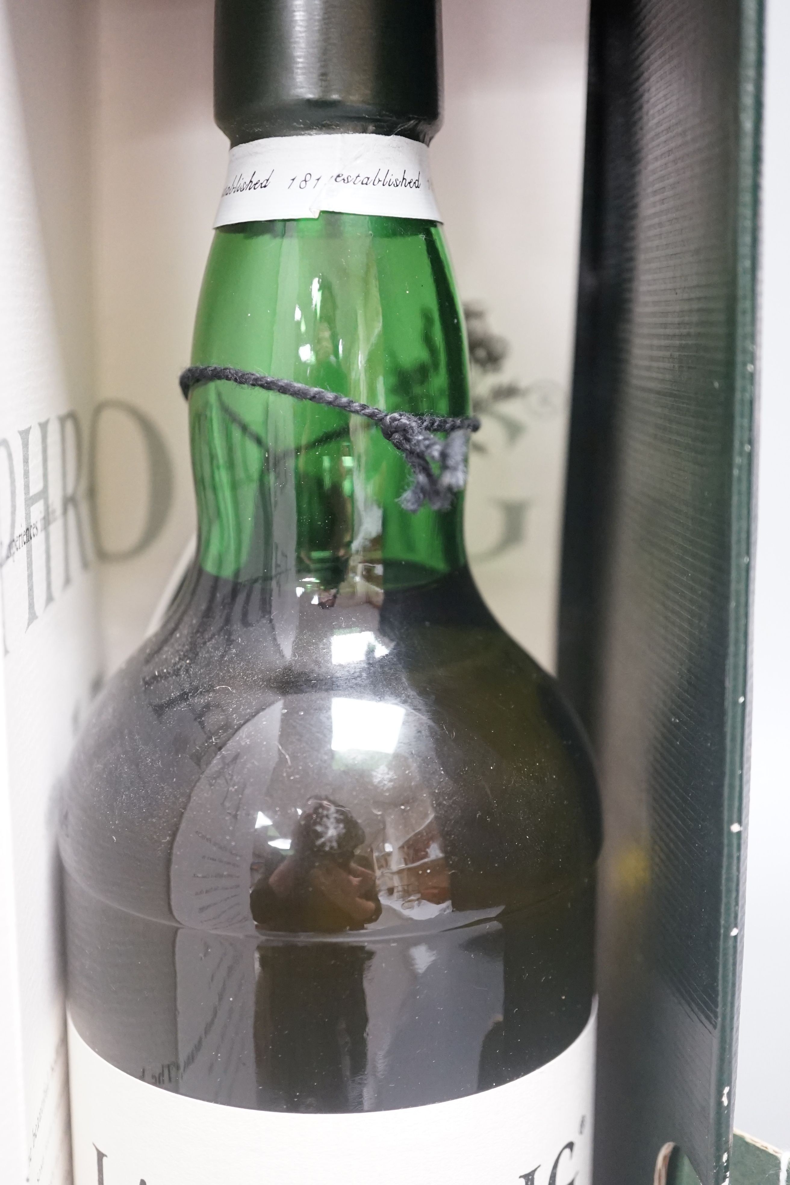 A cased bottle of Laphroaig single Islay malt whisky signed by Margaret Thatcher.